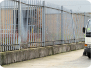 Fencing damaged by vehicle at a distribution centre in Stockport.